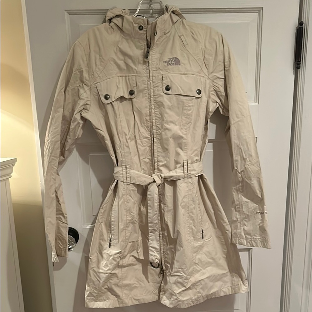 The North Face cream hooded jacket.